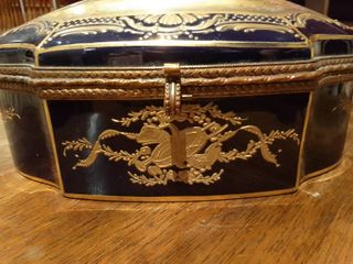 Portagioie Château de Longpré blu e oro