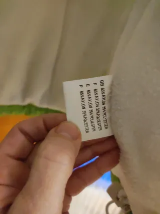 Abrigo corto deportivo negro y verde