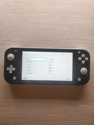 Nintendo Switch Lite Negra + Fundas