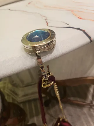 Sujeta bolsos joya azul y plata con espejo