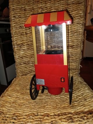 Máquina de palomitas roja y dorada