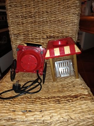 Máquina de palomitas roja y dorada