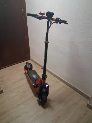 Patinete Eléctrico Naranja y Negro