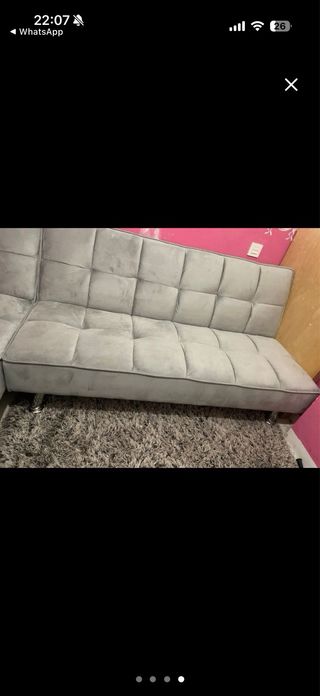 Sofá cama gris de tela