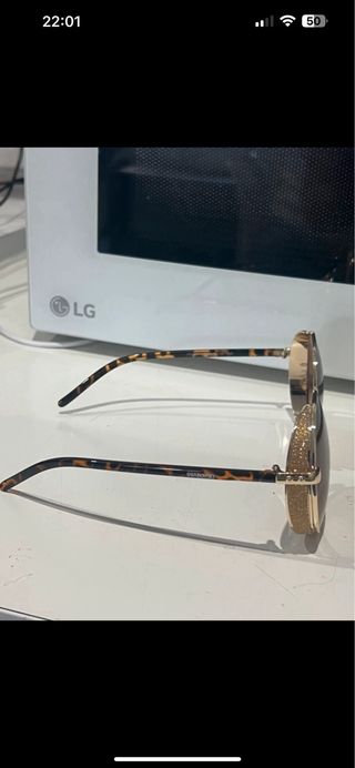 Gafas de sol Swarovski redondas