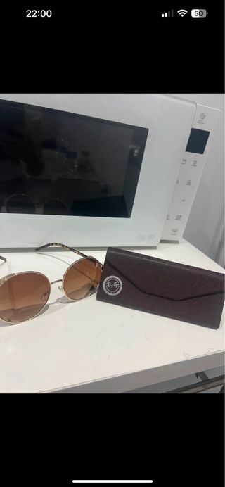 Gafas de sol Swarovski redondas