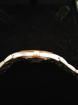 Reloj Tissot PRX Caballero Oro y Plata