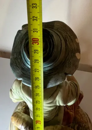 Scultura Capodimonte vintage uomo seduto