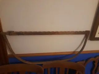 Antigua sierra de podar de dos mangos