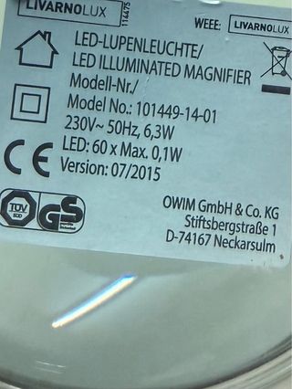 Lámpara lupa con brazo articulado