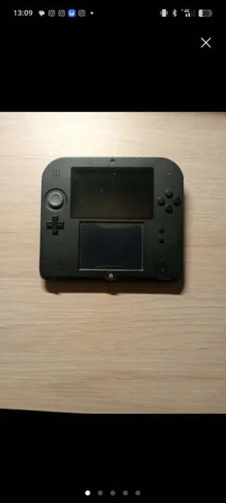 Nintendo 2DS Gris con funda Mario