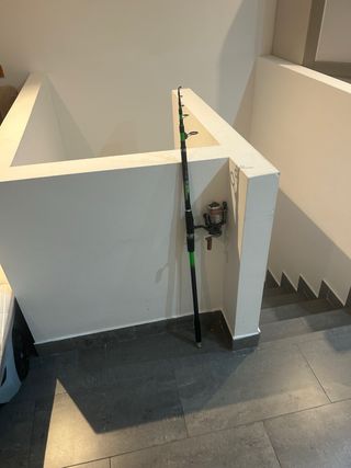 Caña de pescar con carrete