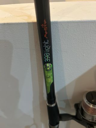 Caña de pescar con carrete