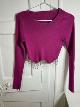 Jersey rosa con adornos plateados