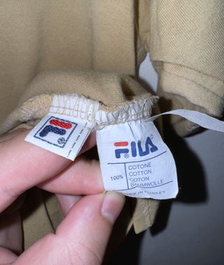 Polo Fila bege com fecho