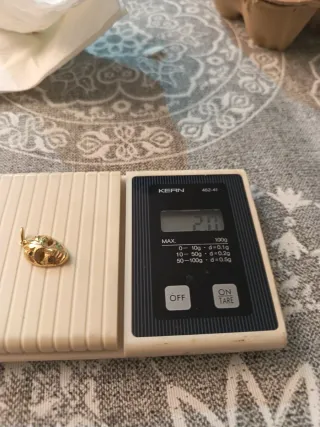 Colgante Máscara Oro 18k, esmeralda y rubí