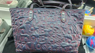 Bolso Love Moschino azul con bolsa y charm metalic