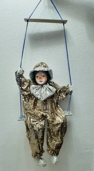 Payaso decorativo vintage infantil con columpio