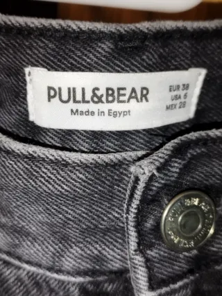 Pantalones vaqueros negros rotos