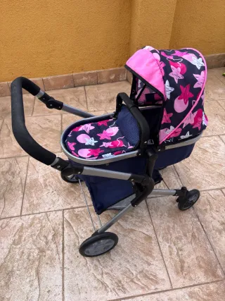 Carrito de muñecas rosa y azul