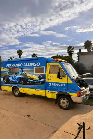 Plataforma grúa porta coches,con rampas .