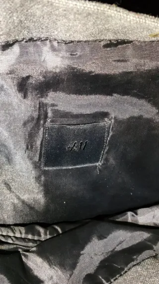 Mochila H&M compartimento único y tela resistente