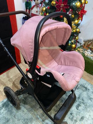 Carrito de bebé rosa
