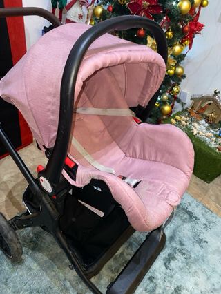 Carrito de bebé rosa