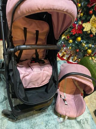 Carrito de bebé rosa