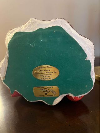 Figura de porcelana de Papá Noel con niño