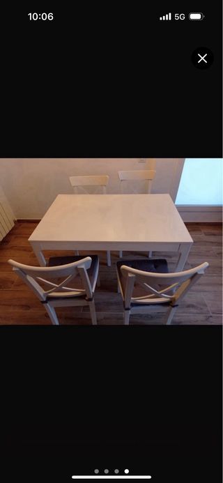 Mesa de comedor blanca.