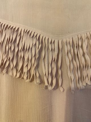 Camisa rosa con flecos