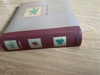 Álbum de fotos con hoja decorativa