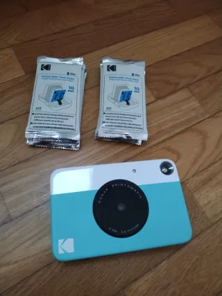 Kodak Printomatic y 8 sobres de papel fotográfico