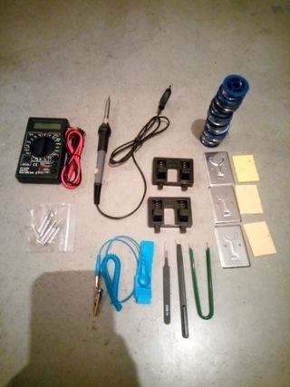 Multímetro, soldador y accesorios