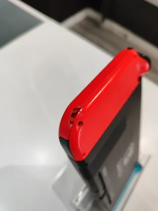 Nintendo Switch con mandos y cargador