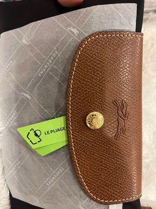 Mala Longchamp preta e castanha