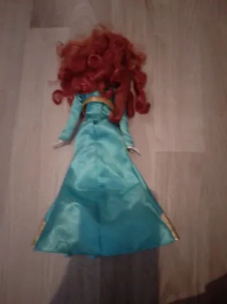 Muñeca Barbie vestido azul y dorado