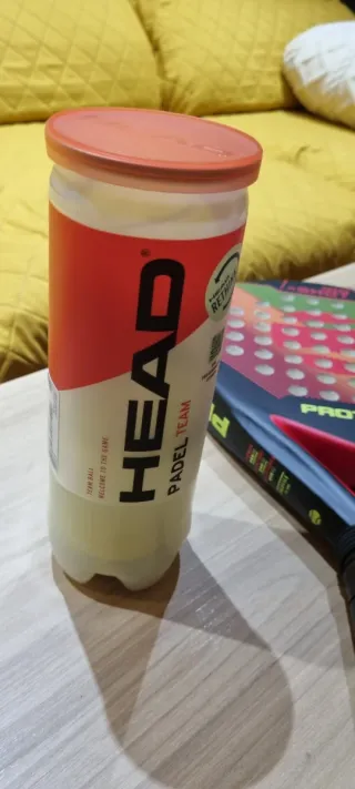 Palas de pádel y bote de pelotas Head