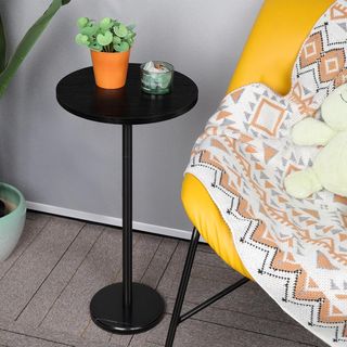 Mesa auxiliar redonda negra y marrón