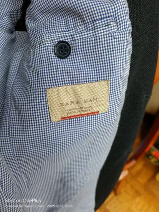 Americana Zara Negra con coderas.