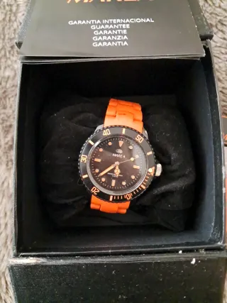 Reloj Marea Naranja y Negro...