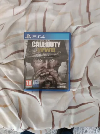 PS4 Negra + 2 Mandos + 4 Juegos