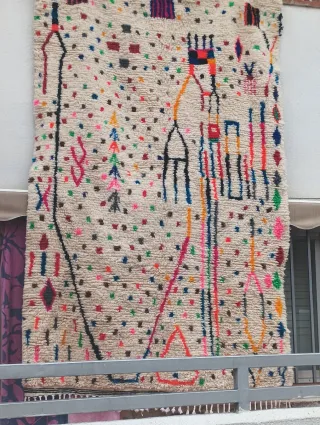 Alfombra beige y multicolor de lana