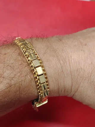 Pulsera- Esclava en  oro 18k con cadena de segurid