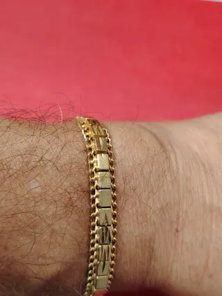 Pulsera- Esclava en  oro 18k con cadena de segurid