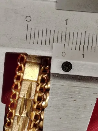 Pulsera- Esclava en  oro 18k con cadena de segurid