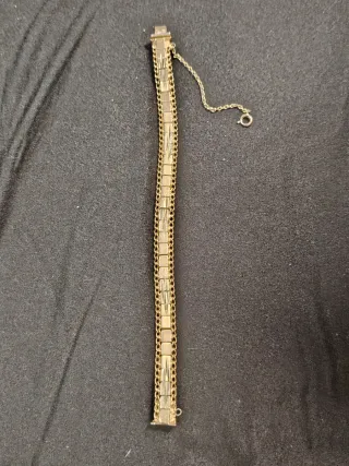 Pulsera- Esclava en  oro 18k con cadena de segurid