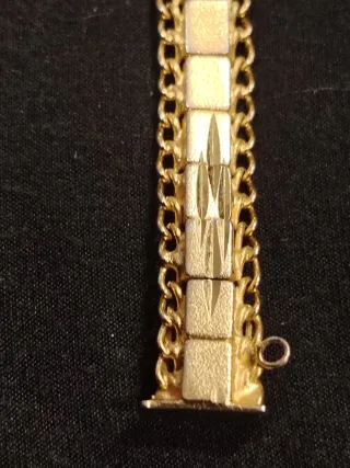 Pulsera- Esclava en  oro 18k con cadena de segurid