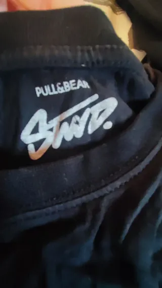 Lote de ropa con tallas y marcas variadas